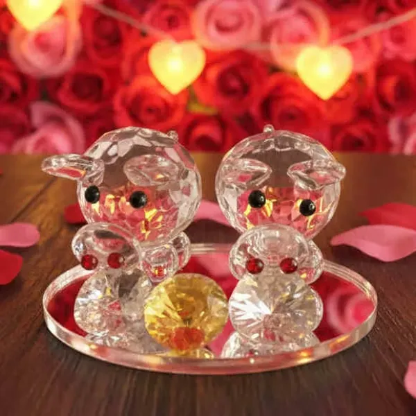 Sklenený párik zamilovaných prasiatok